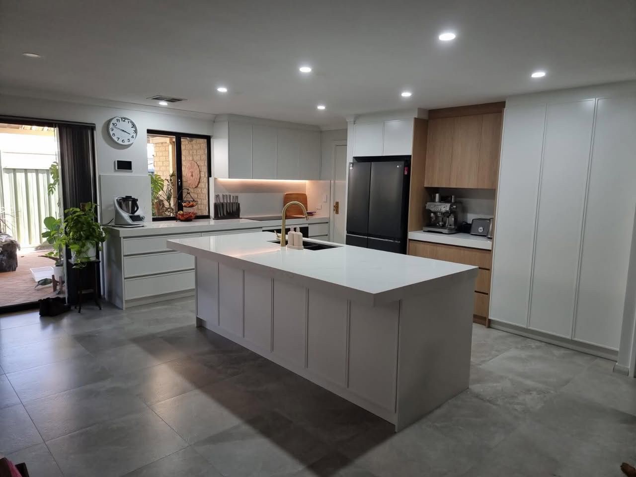 Modern kitchen with recessed LED downlight installation by K Stewart Electrical